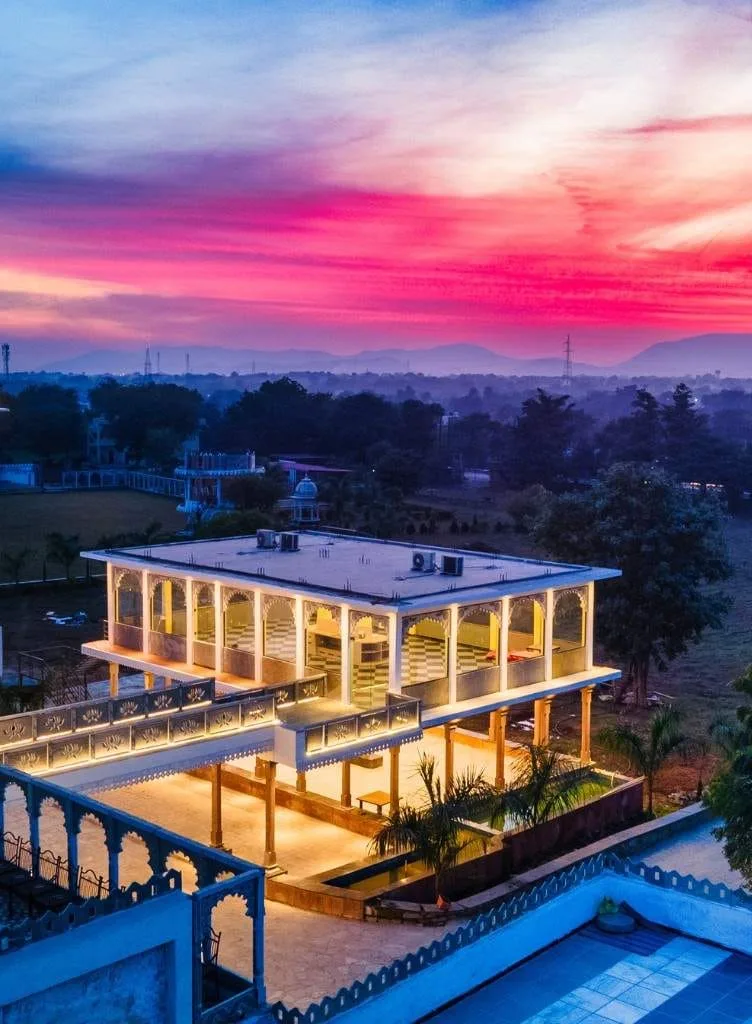 Luxe Stayz The Mewar Resort rooftop restaurant at dusk